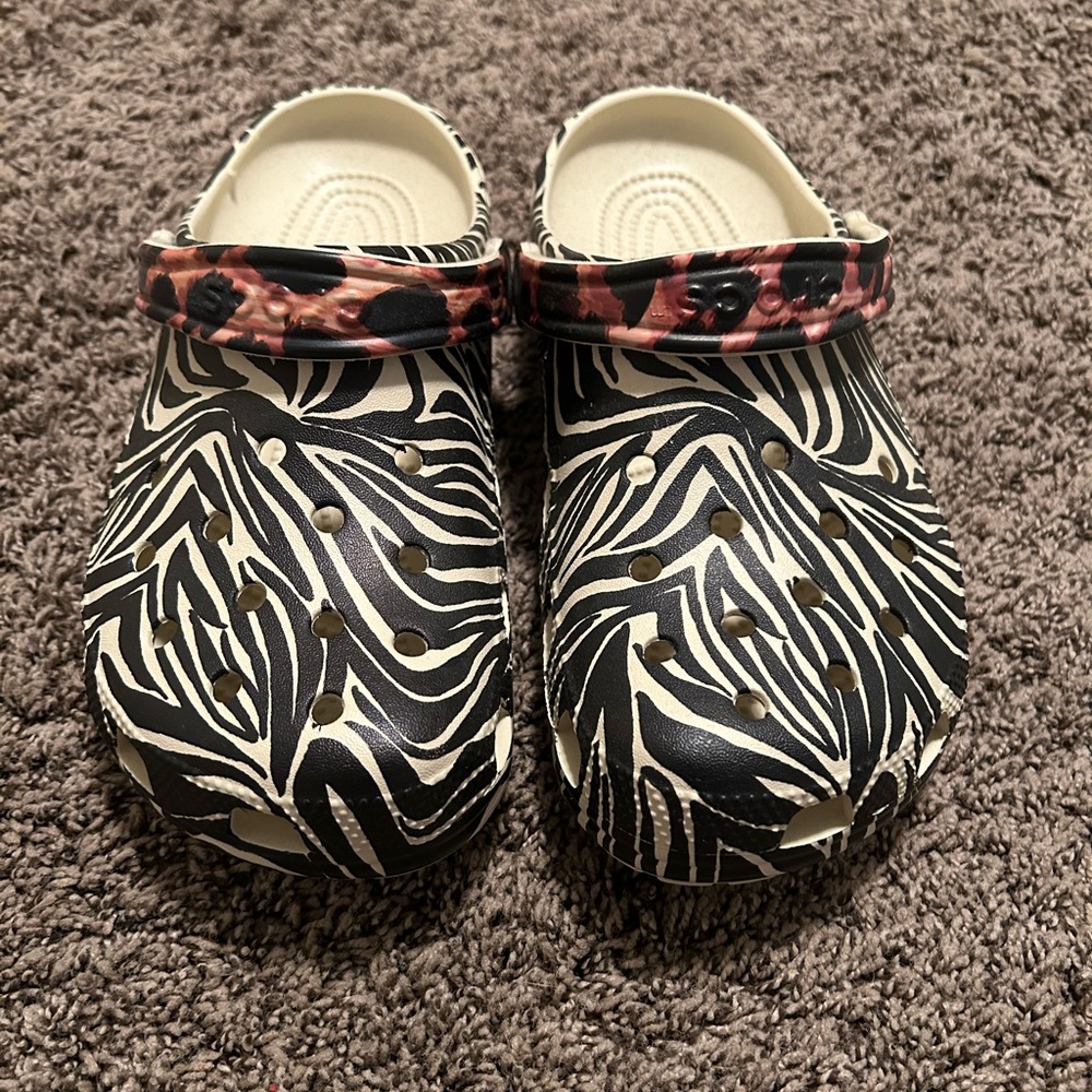 Animal print crocs. Brand new never worn. Size 9 women’s and size 7 men’s.